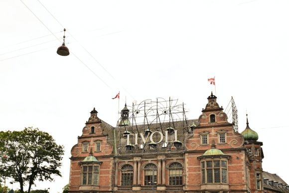 Tourist Restaurant - a large building with a sign on top of it