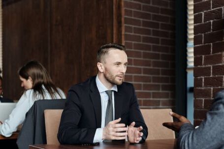 Successful Restaurant - Businessmen Talking at a Cafe