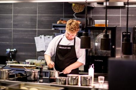 Restaurant Kitchen - Chef Cooking in the Kitchen